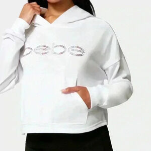 NWT Bebe White Logo Studded Long Sleeve Kangaroo Pocket Cropped Hoodie Size M